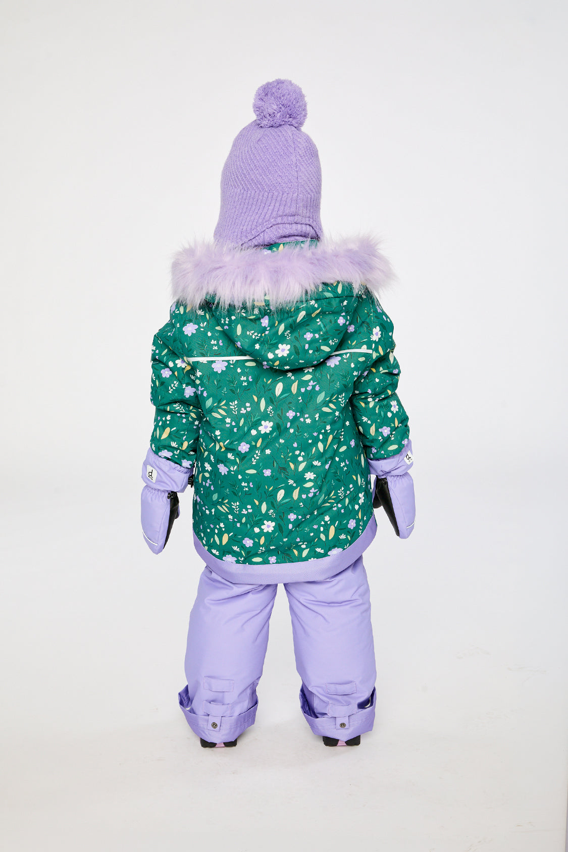 Girl in Deux par Deux -30°C green mini flower snowsuit for winter snow play