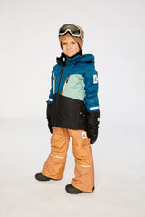Deux par Deux TEKNIK two-piece snowsuit in Navy Blue shown from an alternate modeled winter angle