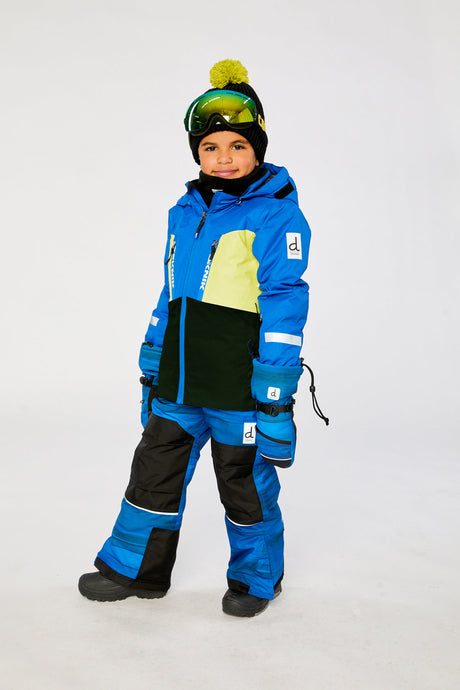 Deux par Deux TEKNIK two-piece snowsuit in Royal Blue and Yellow shown from an alternate modeled winter angle