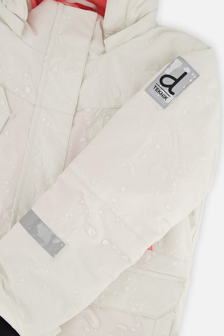 Deux par Deux girls' Teknik two-piece snowsuit, off-white and pink jacket with black pants – logo badge close-up