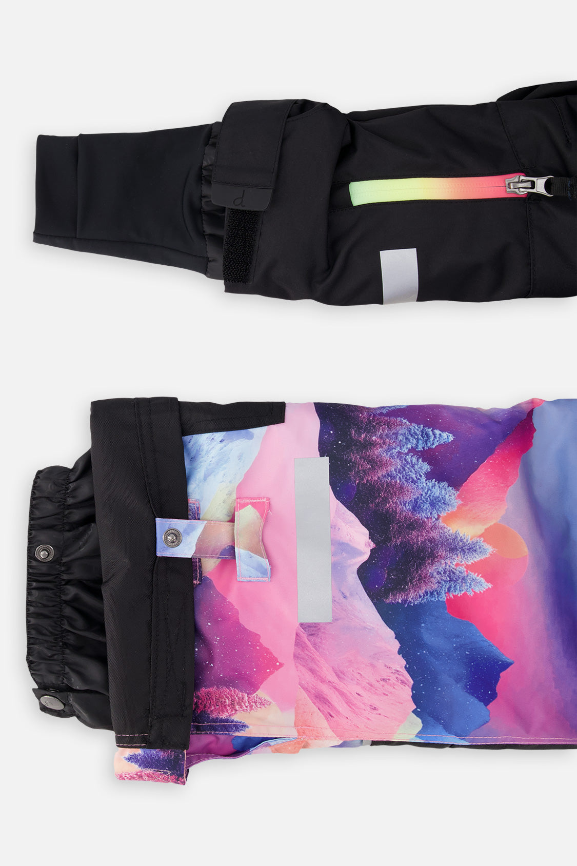 Deux par Deux girls' Teknik snowsuit, black jacket and pink-blue mountain print pants – sleeve cuff and pant hem details