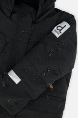 Deux par Deux girls' Teknik two-piece snowsuit, black jacket with leopard print pants – logo badge close-up
