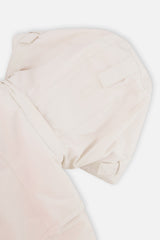 Close-up of the off-white and pink TEKNIK jacket hood