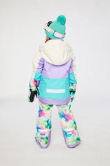Alternate winter lookbook view of the Deux par Deux TEKNIK two-piece snowsuit in Multicolored with A Diamond Pattern