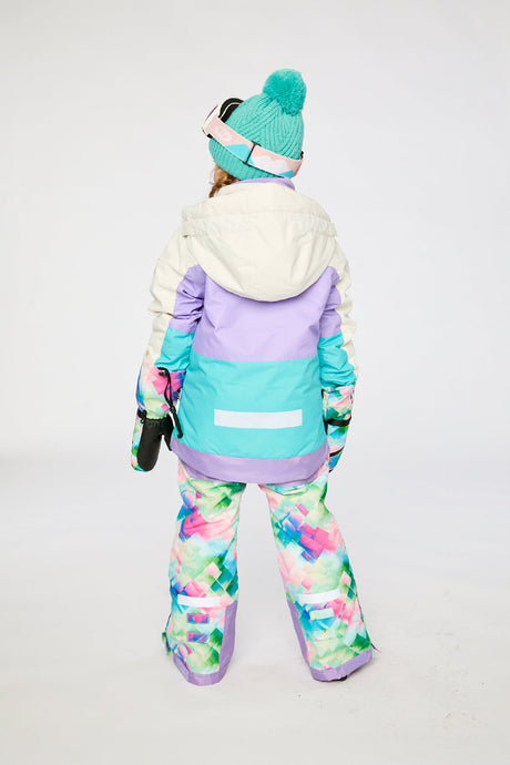 Alternate winter lookbook view of the Deux par Deux TEKNIK two-piece snowsuit in Multicolored with A Diamond Pattern