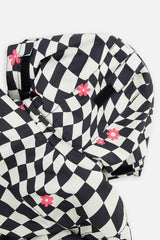 Close-up of the checkered TEKNIK jacket hood