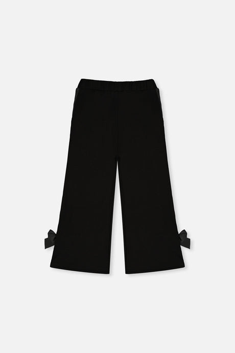 Back view of the Deux par Deux black flare-leg milano pants