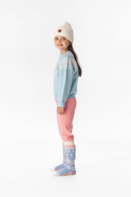 Child wearing the Deux par Deux light blue Nordic jacquard sweater in a lookbook shot