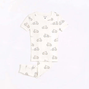 Petit Lem girls La Bicyclette off-white cotton pajama set – front view