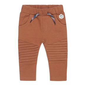 Front view of warm-brown Dirkje baby boys joggers with stitched moto knees