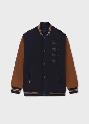 Front view of navy boys varsity jacket with brown sleeves