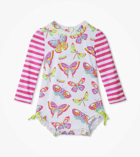 Front view of Hatley Botanical Butterflies baby rashguard with pink striped sleeves