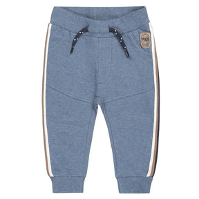 Blue melange Dirkje boys joggers with cream side stripes, front view