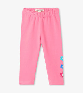 Hatley pink baby leggings with colourful daisy appliqués, front view