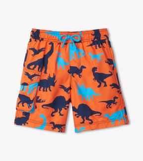 Hatley boys orange Dino Silhouettes board shorts with navy dinosaurs and turquoise drawcord, front view