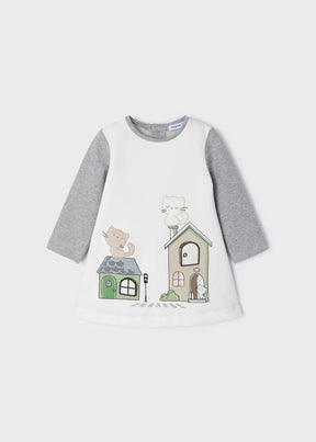 Front view of grey and ivory baby girls dress with cats and houses