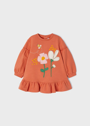 Front view of terracotta baby fleece dress with floral and bee details