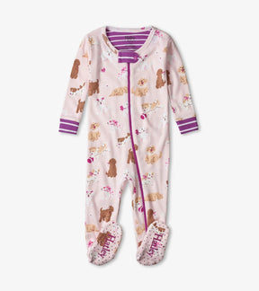 Hatley Flower Pups baby footed coverall in pale pink with purple zipper and striped cuffs, front view