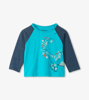 Hatley turquoise baby boys raglan tee with navy sleeves and blue dinosaur graphic, front view
