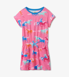 Hatley girls pink drop-waist dress with multicolor unicorns, blue trim and patch pockets, front view
