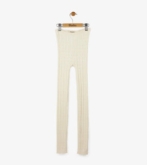 Full-length front view of cream Hatley cable-knit footless tights on a hanger