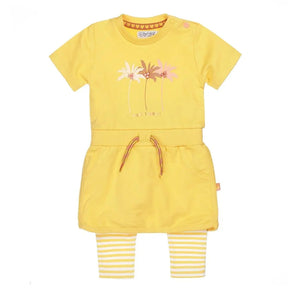 Front view of yellow Dirkje baby girls palm dress and striped legging set