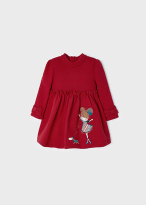 Front view of red Mayoral baby girls dress with character graphic and bow cuffs