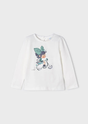 Front view of ivory girls long-sleeve top with scooter graphic and sequins