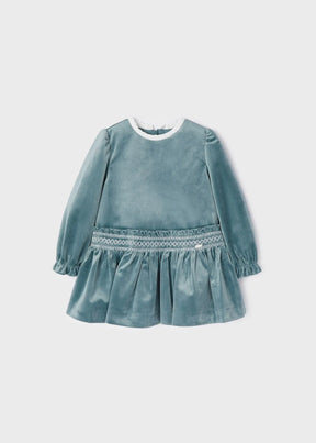 Front view of teal baby dress with white collar and smocked waist
