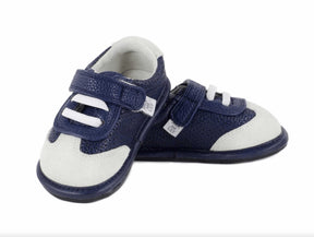 Navy and white baby trainer with hook-and-loop strap, angled view