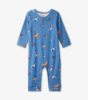 Front of Hatley blue Little Pups baby romper with dog print and two-button Henley neckline