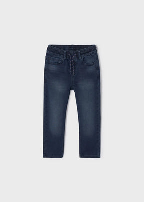 Front view of dark blue boys denim jogger pants with drawcord waist