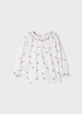 Front view of ivory girls long-sleeve floral print top