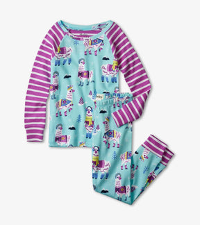 Hatley Mountaineer Alpacas aqua pajamas with alpacas in winter outfits, purple-striped raglan sleeves and matching pants.