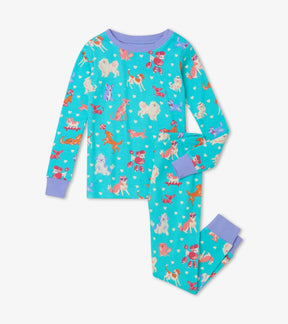 Front view of Hatley Playful Puppies girls' pajama set in aqua with assorted dogs, hearts and lilac cuffs.