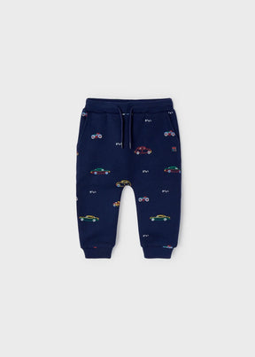 Front view of navy baby joggers with colourful car and motorcycle print