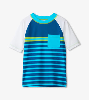 Front view of Hatley Sea Stripes rashguard with blue stripes, white sleeves and turquoise pocket