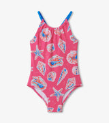 Front view of Hatley girls pink one-piece swimsuit with colorful seashell print