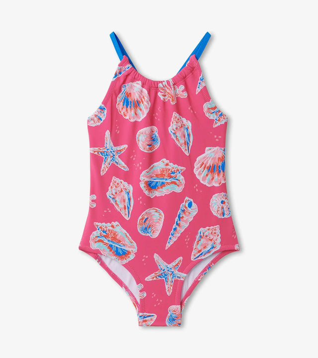 Front view of Hatley girls pink one-piece swimsuit with colorful seashell print