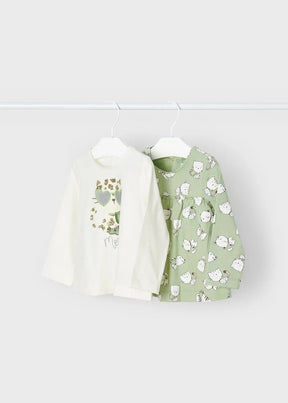 Ivory owl graphic top and sage cat print top hanging side by side