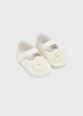 Ivory Mayoral baby shoes with instep straps, front view