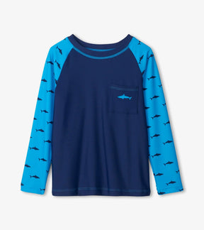 Front view of Hatley Silhouette Sharks rashguard with navy body and blue shark-print sleeves