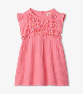 Hatley baby girls coral cap-sleeve dress with colorful dimensional flower appliqués, front view