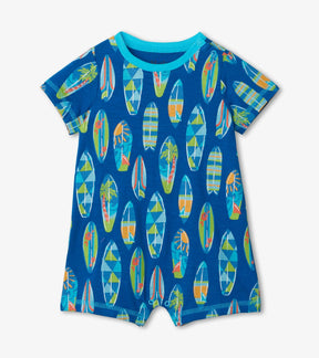 Hatley baby boys bright blue romper with colorful surfboard print and turquoise trim, front view