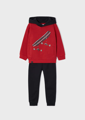 Front view of red skateboard hoodie and black jogger tracksuit