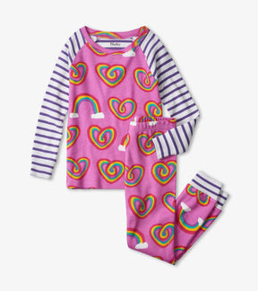 Hatley pink rainbow-heart pajama top and matching pants with purple-and-white striped sleeves and ankle cuffs.
