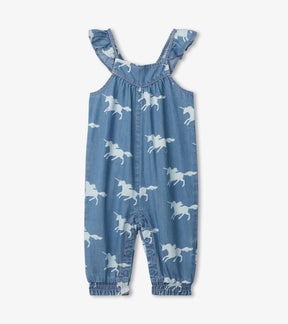 Hatley baby girls blue denim-look romper with white unicorn print and ruffled straps, front view