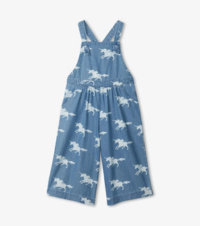 Front view of Hatley blue chambray romper with white unicorn silhouettes and pockets