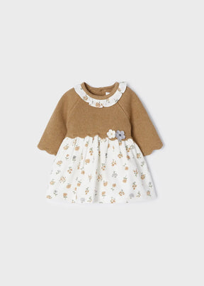 Front view of brown knit and ivory floral baby girls dress