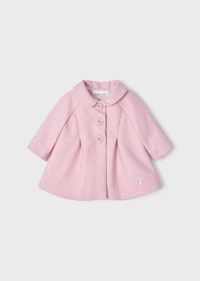 Front view of light pink baby coat with rounded collar and buttons